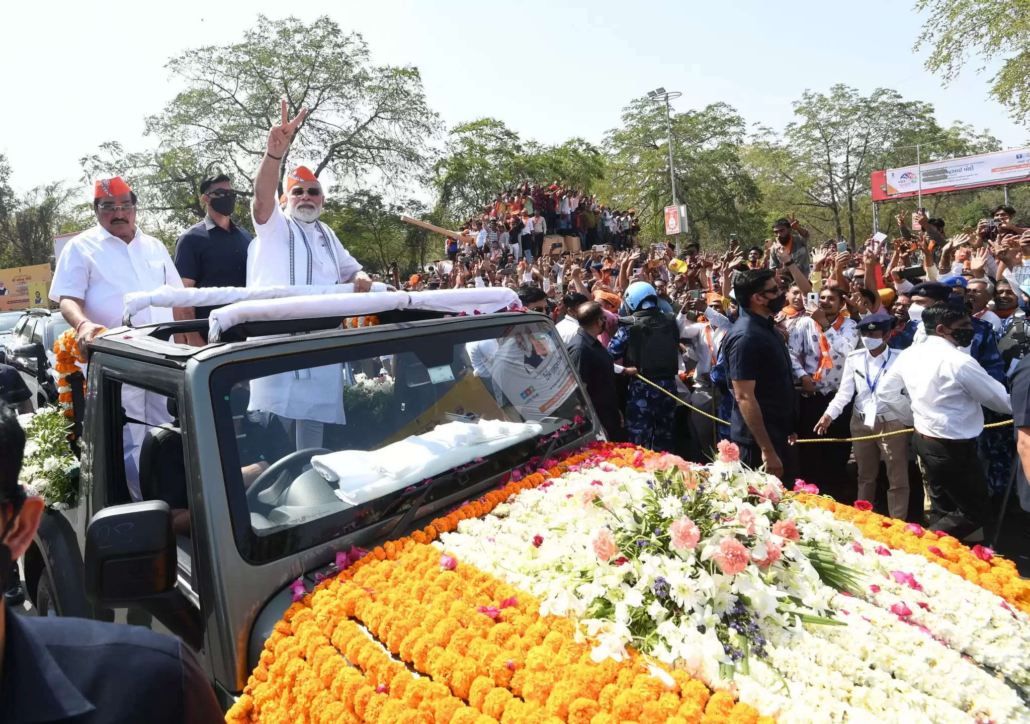 Modi's grand roadshow in his home-state Gujarat after a massive victory in five state elections